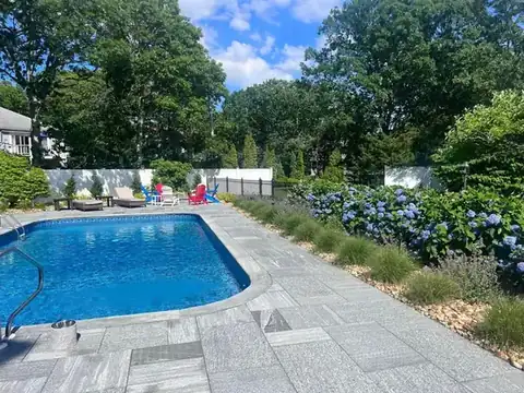 Pool with paver deck and hydrangea plantings