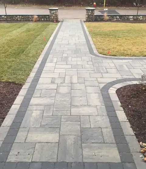 Long paver walkway with contrasting border
