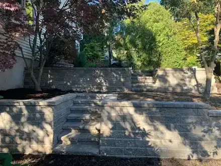 New segmental retaining wall and steps after the renovation